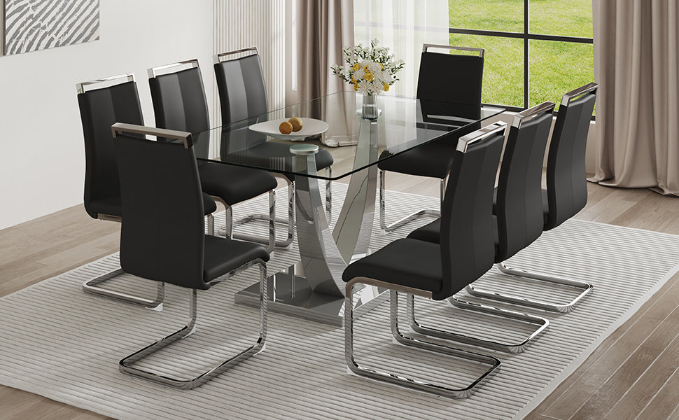 Table And Chair Set. Large Modern Rectangular Table With Glass Top And Silver Metal Legs. Furnished With Soft And Comfortable Pu Chairs With Faux Leather Upholstered Seats And Silver Metal Legs. Black Silver Seats 8 Glass Metal