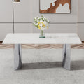 Modern Minimalist Dining Table. The White Imitation Marble Glass Desktop Is Equipped With Silver Metal Legs. Suitable For Restaurants And Living Rooms 71