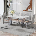 Modern Minimalist Dining Table. The White Imitation Marble Glass Desktop Is Equipped With Silver Metal Legs. Suitable For Restaurants And Living Rooms 71