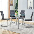 Table And Chair Set. 1 Table 4 Gray Chairs Round Dining Table With A 40 Inch Diameter Glass Tabletop And Silver Plated Metal Legs. 4 Gray Pu Chairs Dt 1164 001 Transparent Seats 4 Glass