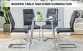 Table And Chair Set. 1 Table 4 Gray Chairs Round Dining Table With A 40 Inch Diameter Glass Tabletop And Silver Plated Metal Legs. 4 Gray Pu Chairs Dt 1164 001 Transparent Seats 4 Glass