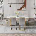 Modern Minimalist Dining Table. The White Imitation Marble Glass Desktop Is Equipped With Golden Metal Legs. Suitable For Restaurants And Living Rooms 71 