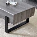 A Coffee Table Made Of Mdf Material. Equipped With Drawers Made Of Solid Wood Material. Can Store Things And Save Space. Paired With Black Metal Table Legs. Suitable For Living Room. Grey Mdf