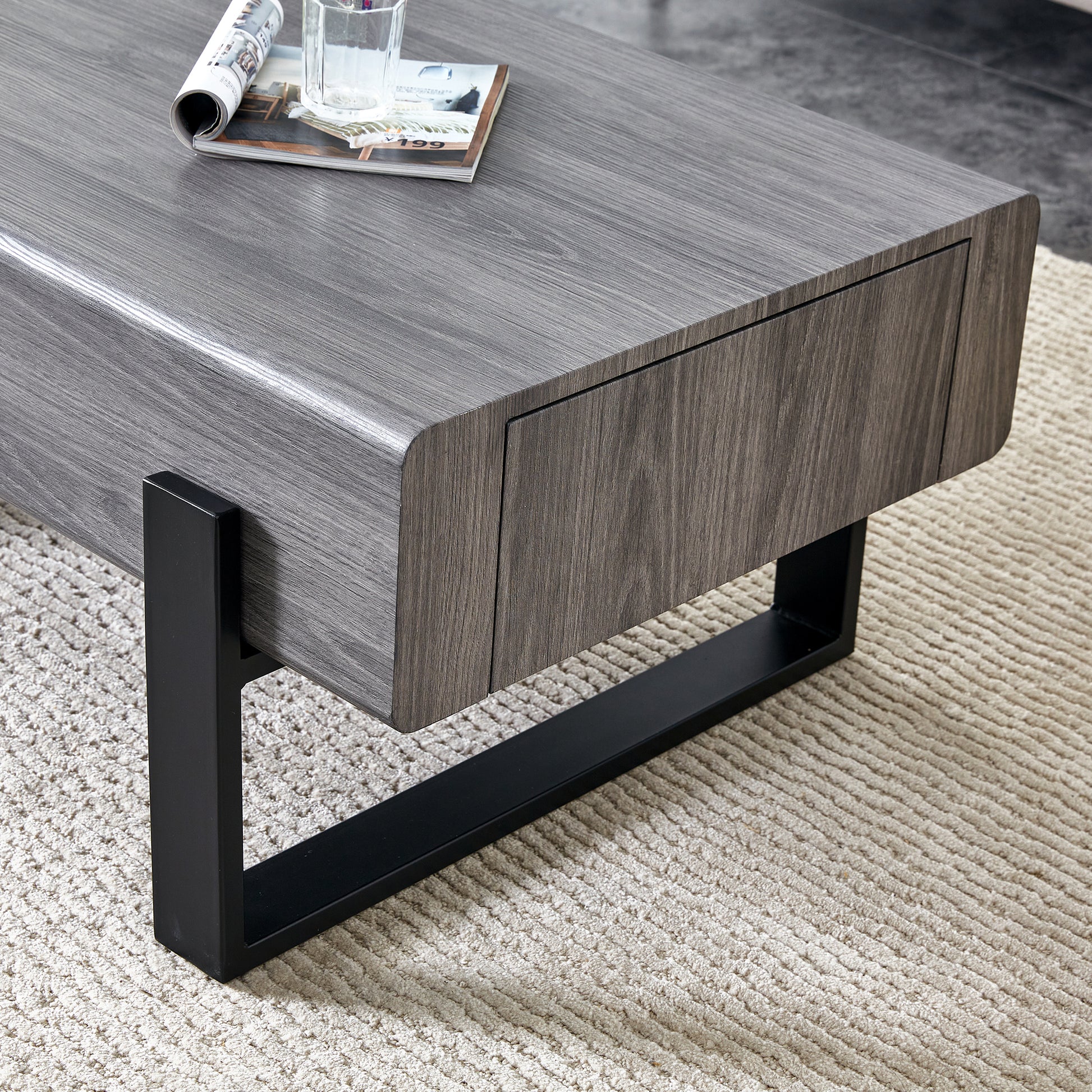 A Coffee Table Made Of Mdf Material. Equipped With Drawers Made Of Solid Wood Material. Can Store Things And Save Space. Paired With Black Metal Table Legs. Suitable For Living Room. Grey Mdf