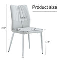 Four Light Gray Dining Chairs. A Medieval Modern Chair Made Of Pu Material With Soft Cushions And Silver Metal Legs. Suitable For Restaurants And Living Rooms Light Gray Pu