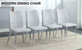 Four Light Gray Dining Chairs. A Medieval Modern Chair Made Of Pu Material With Soft Cushions And Silver Metal Legs. Suitable For Restaurants And Living Rooms Light Gray Pu