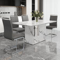 A Simple Dining Table. A Dining Table With A White Marble Pattern. 4 Pu Synthetic Leather High Backrest Cushioned Side Chairs With C Shaped Silver Metal Legs. Dt Sq 16090 Whc 1162 White Mdf