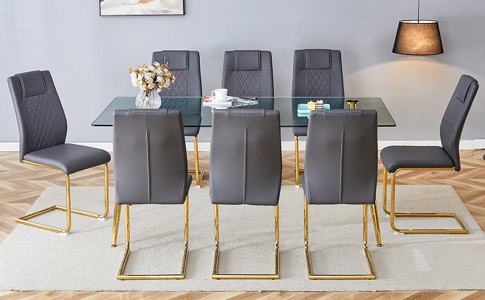 Table And Chair Set.Modern Rectangular Glass Dining Table With A Tempered Glass Tabletop And Metal Legs, Paired With Multiple Chairs Designed With Pu Cushions And Golden Metal Legs. Grey Gold Seats 8 Tempered Glass