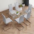 Modern Simple Rectangular Glass Dining Table, Solid Tempered Glass Tabletop, Electroplated Table Legs, Gray Pu Dining Chair Set, Suitable For Restaurant Kitchen Use Set Of 7 Upholstered Chair Glass Gray Pu Seats 6 Metal Rectangular Dining Table With