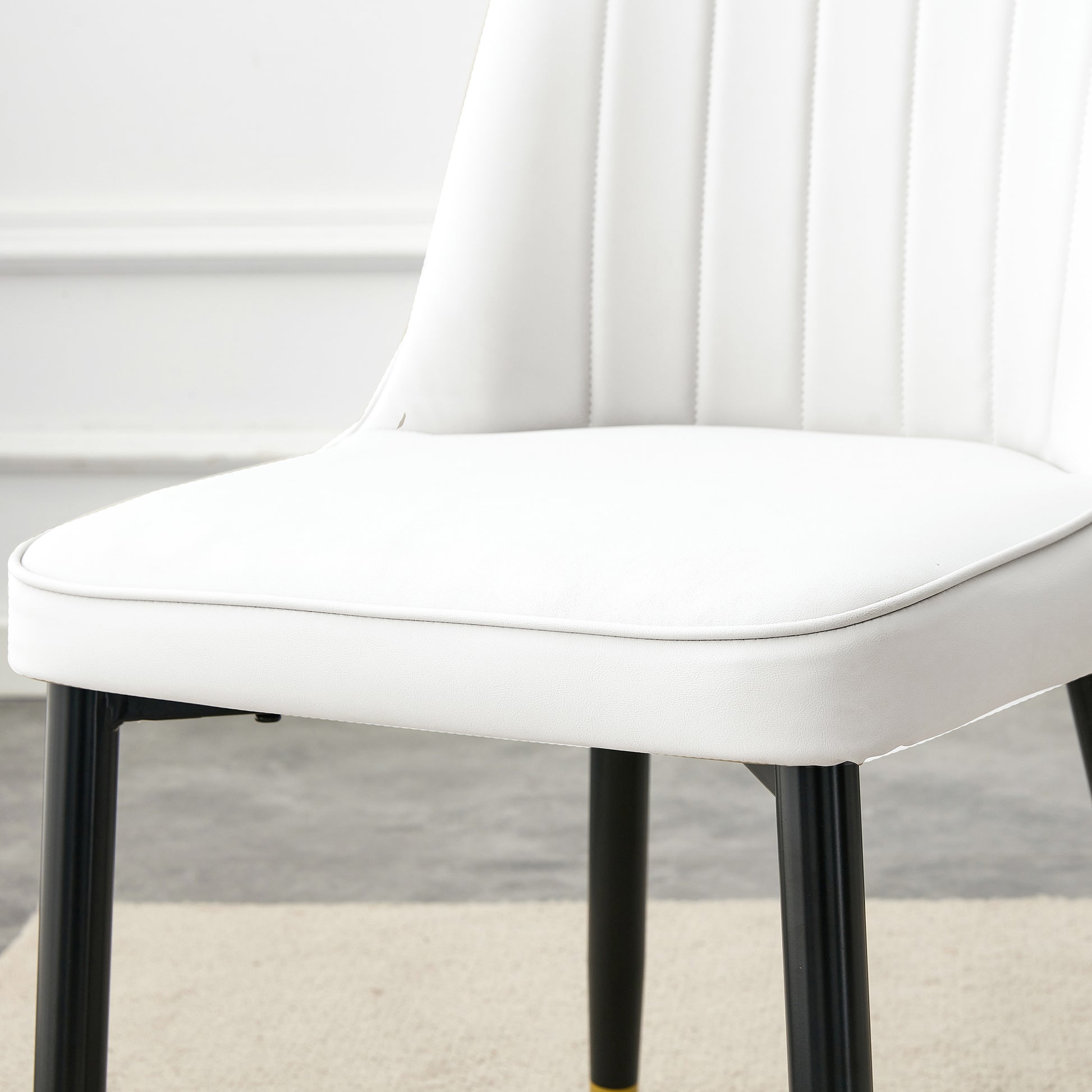 Table And Chair Set.The Table Has A Glass Top With Imitation Marble Pattern Stickers And Stainless Steel Golden Legs. Paried With Chairs With Pu Artificial Leather Backrest Cushions And Black Legs. Black Gold Seats 8 Glass Metal