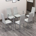 Table And Chair Set.Rectangular Dining Table With Tempered Glass Tabletop And Silver Plating Metal Legs.Paired With 6 Checkered Armless High Back Light Gray Chairs With Electroplated Metal Legs. Transparent Seats 6 Glass Metal