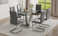 Table And Chair Set. Large Modern Rectangular Table With Glass Top And Silver Metal Legs. Furnished With Soft And Comfortable Pu Chairs With Faux Leather Upholstered Seats And Silver Metal Legs. Gray Silver Seats 6 Glass Metal