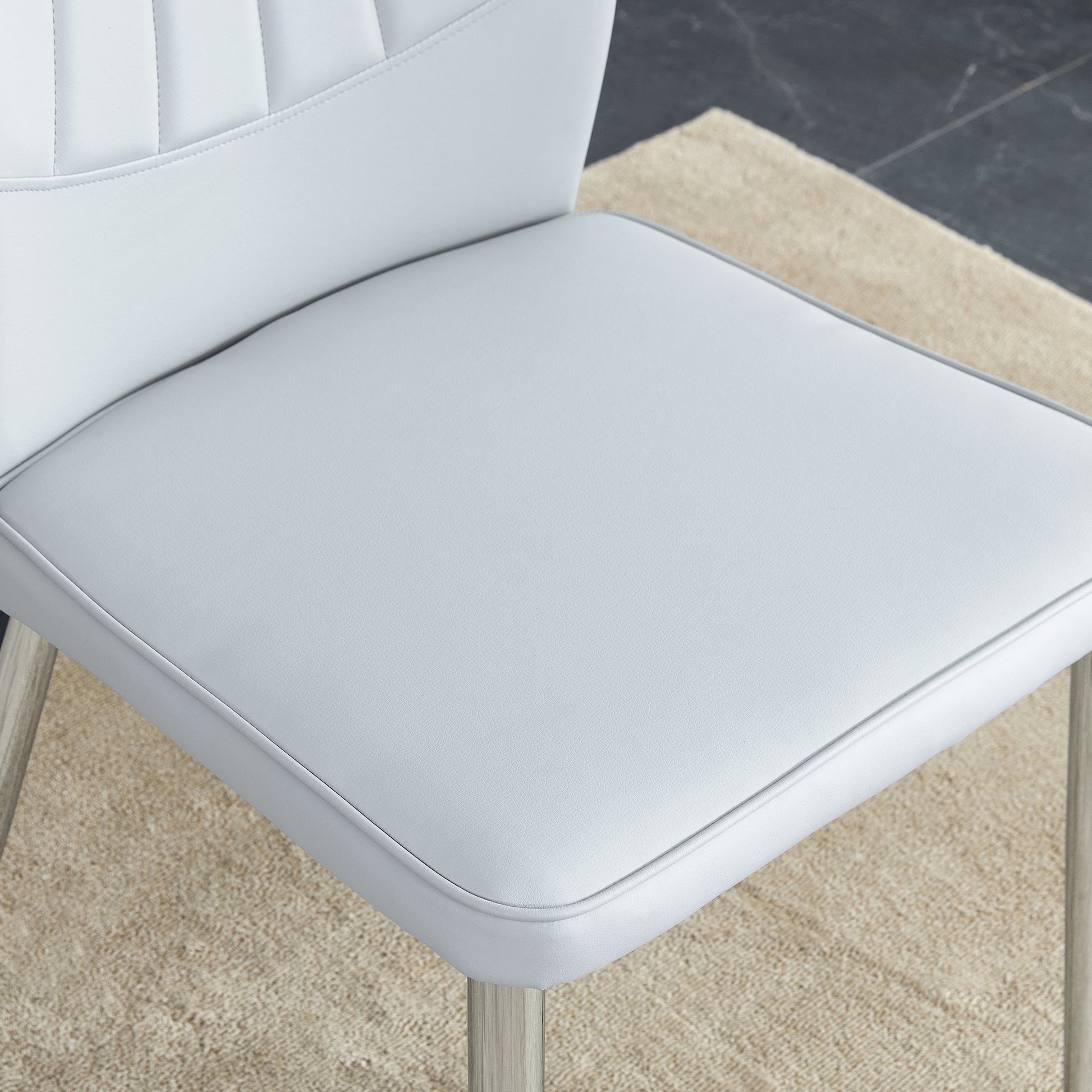 Table And Chair Set.Contemporary, Minimalist Rectangular Dining Table Featuring A Clear Tempered Glass Top And Sleek Silver Legs. Paried With Chairs Made Of Pu Material Cushion And Silver Metal Legs. Light Gray Seats 6 Glass Metal