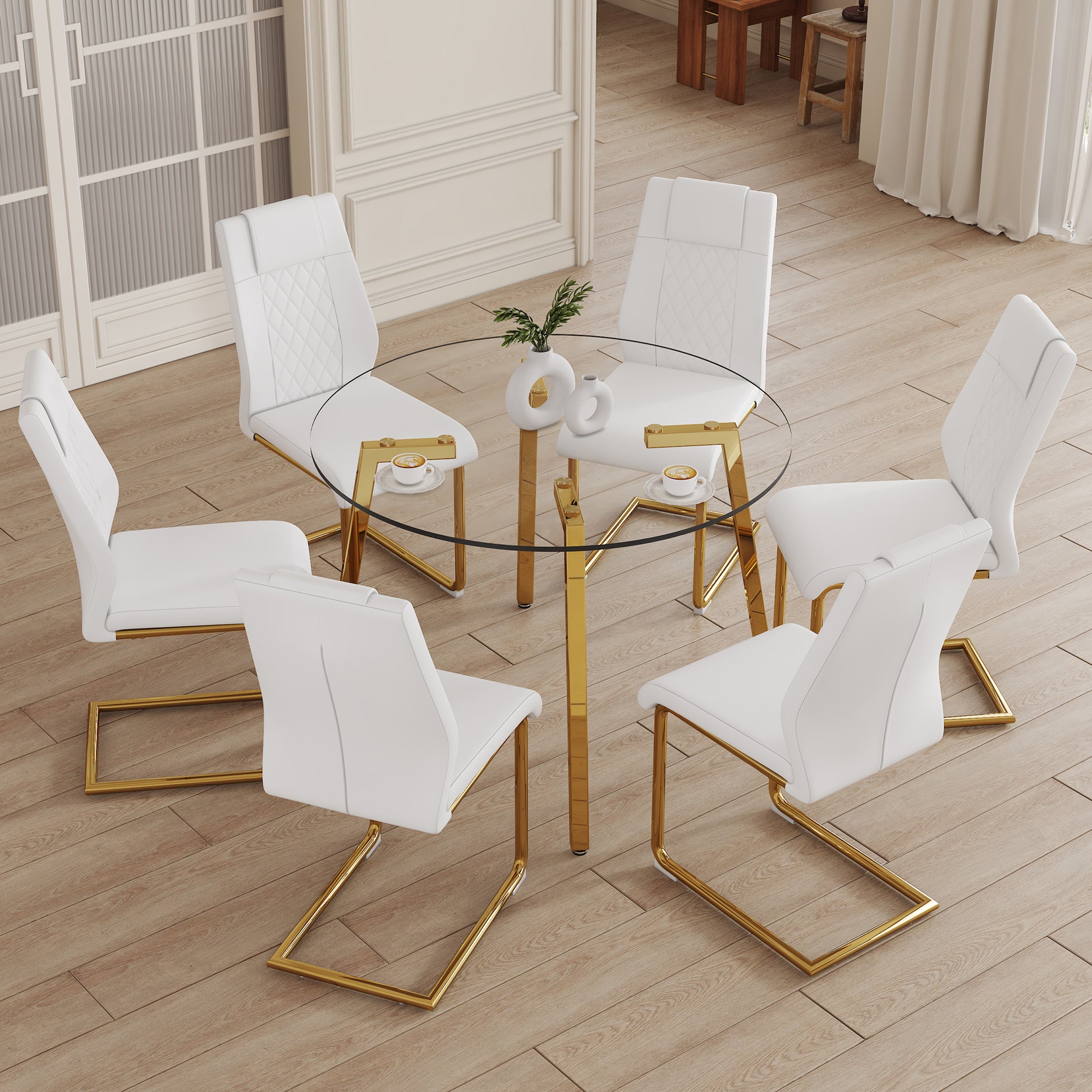 Table And Chair Set.A Modern Minimalist Style Round Clear Tempered Glass Table With Metal Legs.Paried With White Chairs With Modern Pu Leather High Back Upholstered And C Tube Golden Legs. Transparent Seats 6 Glass