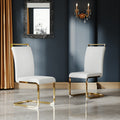 A Set Of 4 Artificial Leather Dining Chairs, Featuring An Arched Chair Design And Paired With Stainless Steel Legs. Gold White Pu Leather