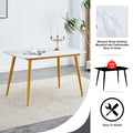 Table And Chair Set.A Morden Table With White Imitation Marble Patterned Stone Burning Tabletop With Golden Metal Legs.Paried With 4 Chairs With Pu Leather Backrest And Black Metal Legs. Black,White Gold Seats 4 Metal,Sintered Stone