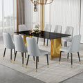 Table And Chair Set.The Table Has A Glass Top With Imitation Marble Pattern Stickers And Stainless Steel Golden Legs. Paried With Chairs With Pu Artificial Leather Backrest Cushions And Black Legs. Black Gold Seats 8 Glass Metal