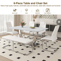 Table And Chair Set. Large Modern Rectangular Table With White Textured Top And Silver Metal Legs. Soft And Comfortable Pu Seats, Faux Leather Upholstered Seats And Sturdy Metal Legs. White Mdf Metal