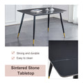 Table And Chair Set. Large Modern Rectangular Table With Black Textured Top And Black Metal Legs. Soft And Comfortable Pu Seats, Faux Leather Upholstered Seats And Sturdy Metal Legs. White Black Seats 4 Sintered Stone