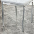 Table And Chair Set.Rectangular Dining Table With Tempered Glass Tabletop And Silver Plating Metal Legs.Paired With 6 Checkered Armless High Back Light Gray Chairs With Electroplated Metal Legs. Transparent Seats 6 Glass Metal