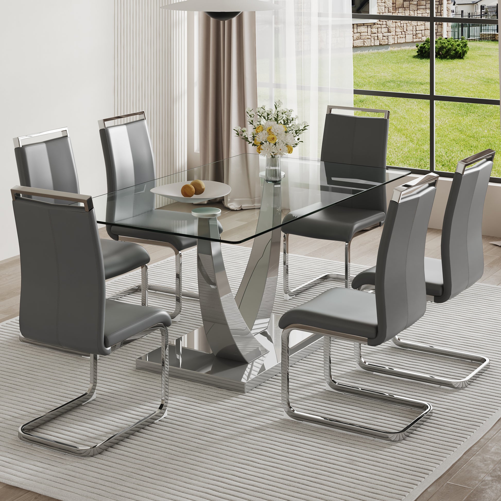 Table And Chair Set. Large Modern Rectangular Table With Glass Top And Silver Metal Legs. Furnished With Soft And Comfortable Pu Chairs With Faux Leather Upholstered Seats And Silver Metal Legs. Gray Silver Seats 6 Glass Metal
